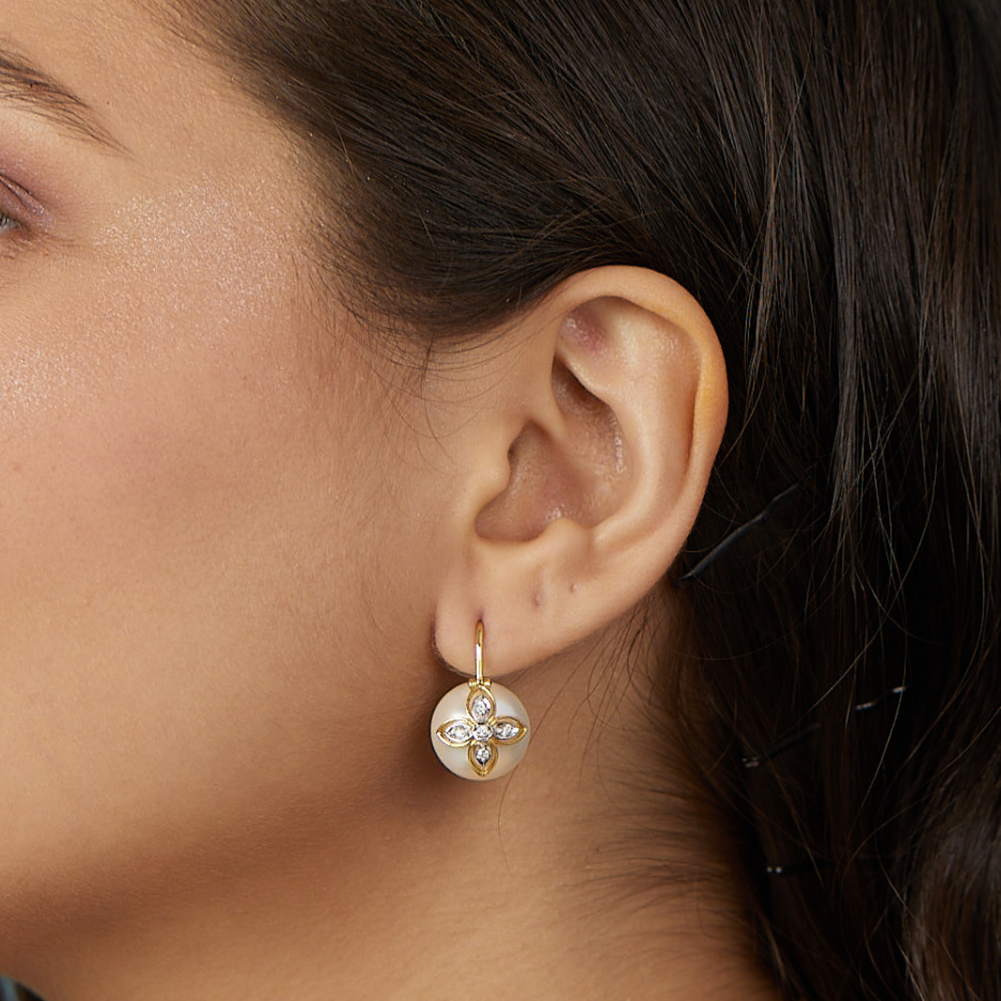 The layered leaf earrings with diamonds and pearls