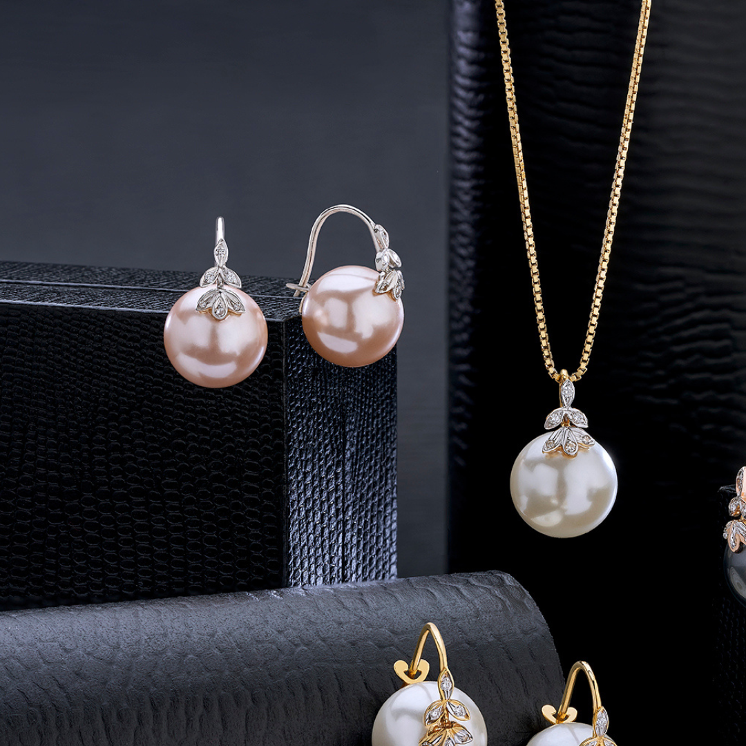 The classic 6 petal diamond and pearl earrings