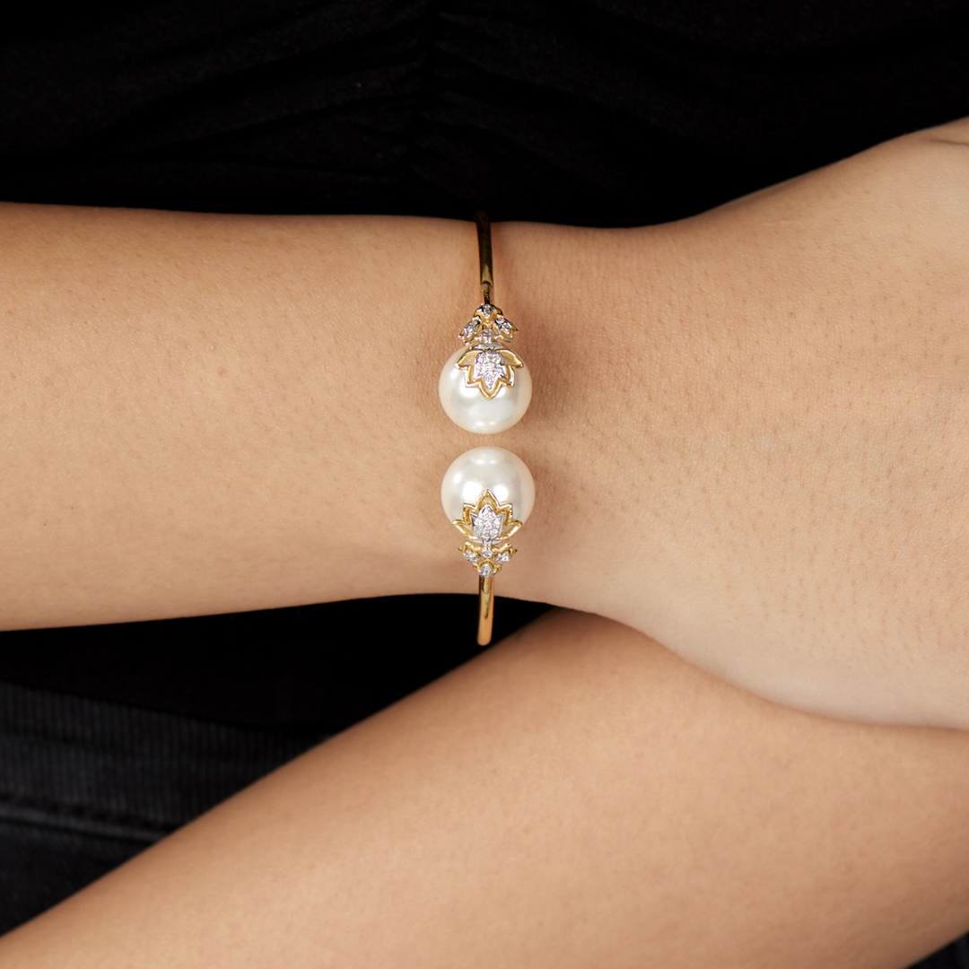 The inverted lotus diamond and pearl bangle