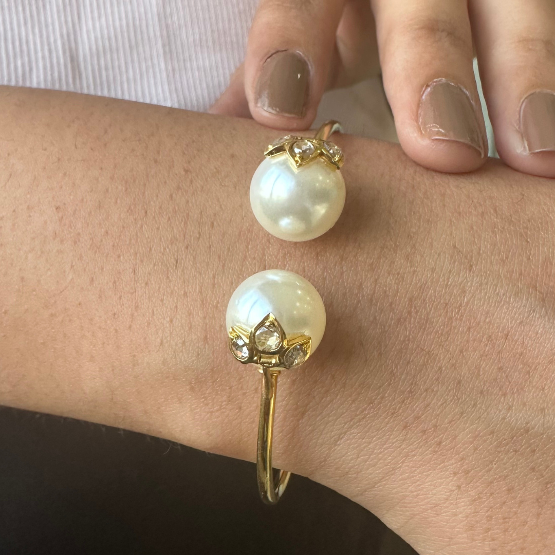 The classic 3 petal rosecut diamond and pearl bangle