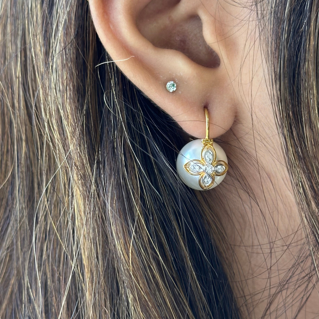 The layered leaf earrings with diamonds and pearls