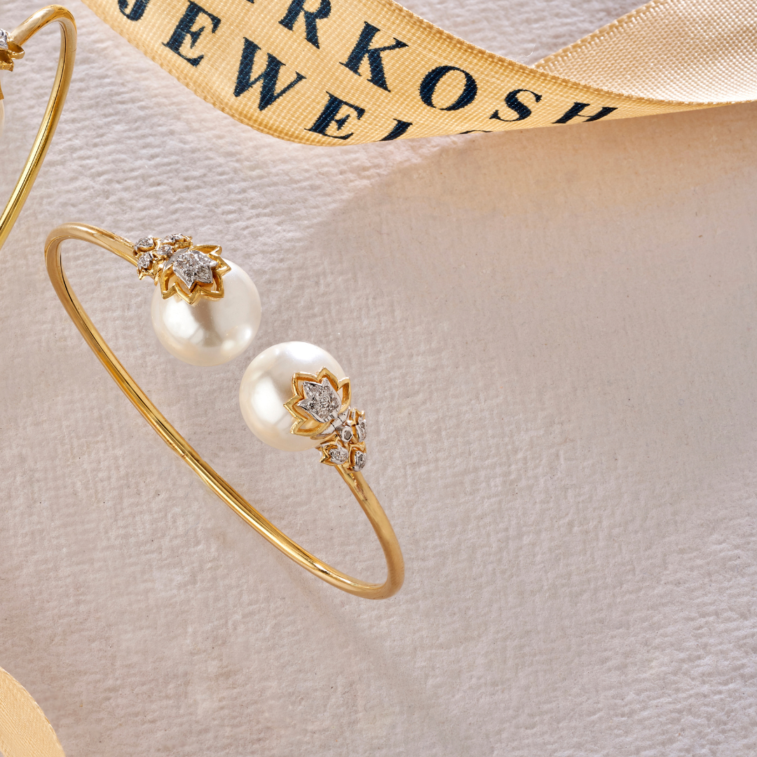 The inverted lotus diamond and pearl bangle