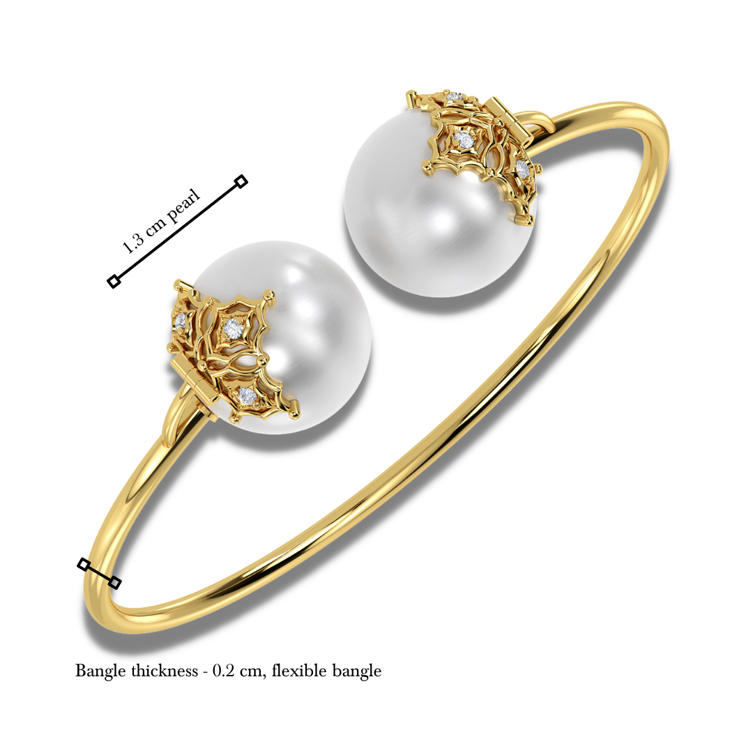 The filigree diamond and pearl bangle